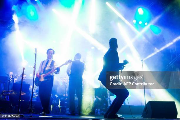 Jeremie Coke and Jame Copley of French band Electro Deluxe perform during the 24th edition of the Cognac Blues festival in Cognac on July 8, 2017. /...