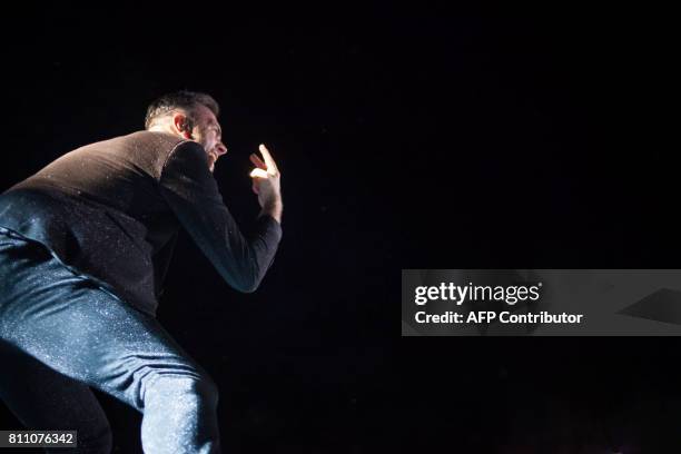 Jame Copley of French band Electro Deluxe performs during the 24th edition of the Cognac Blues festival in Cognac on July 8, 2017. / AFP PHOTO /...