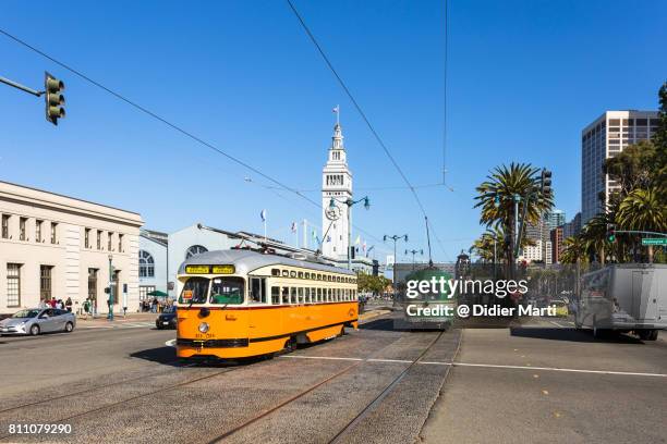 historic tramway on the embarcadero along san francisco waterfront in california - embarcadero summer photos et images de collection