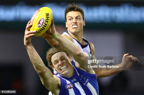 Ben Brown of the Kangaroos marks the ball during the round 16 AFL match between the North Melbourne Kangaroos and the Fremantle Dockers at Etihad...