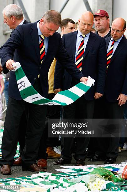 Walter Smith, Ally McCoist and Kenny McDowell of Rangers, pay tribute at Celtic Park, to Celtic and Scotland legend, Tommy Burns who died yesterday...