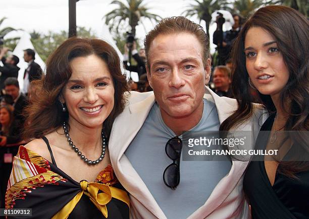 Belgian actor Jean-Claude Van Damme poses with his wife Gladys Portugues and guest as he arrives for the screening of French director Arnaud...