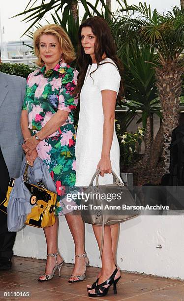 Actresses Catherine Deneuve and Chiara Mastroianni attend the Un Conte de Noel photocall at the Palais des Festivals during the 61st Cannes...