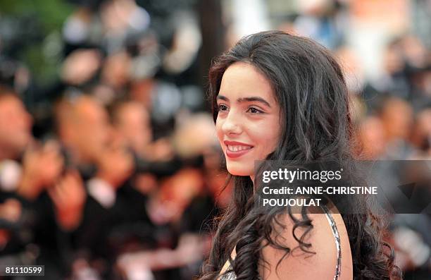 French actress Farida Benkhetache poses as she arrives for the screening of French director Arnaud Desplechin's film 'A Christmas Tale' at the 61st...