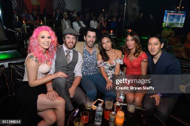 Model Annalee Belle, television personalities J.D. Scott and Drew Scott and Linda Phan attend the Coach Woodson Las Vegas Invitational red carpet and...