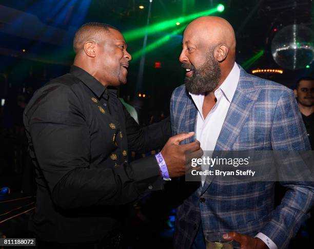 Actor/comedian Chris Tucker and Los Angeles Clippers Assistant Coach Mike Woodson attend the Coach Woodson Las Vegas Invitational red carpet and...