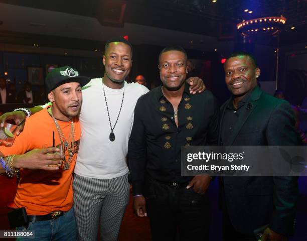 Actors/comedians Flex Alexander and Chris Tucker attend the Coach Woodson Las Vegas Invitational red carpet and pairings gala at 1 OAK Nightclub at...