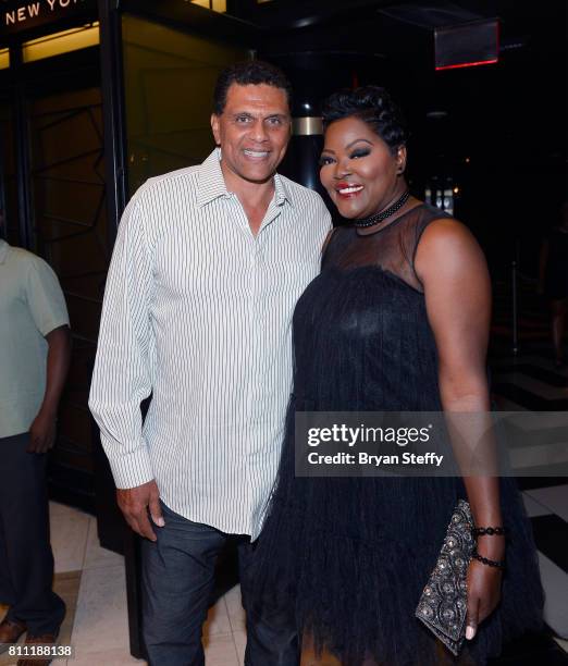 Former professional basketball player Reggie Theus and Wanda Durrant attend the Coach Woodson Las Vegas Invitational red carpet and pairings gala at...