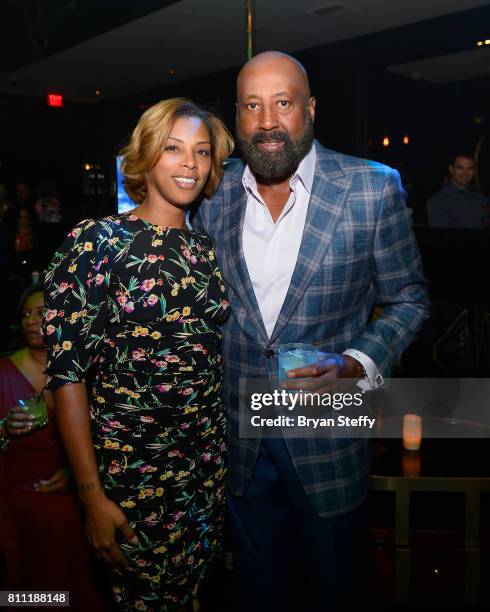 Grab a Ball & Play Foudner Jazmin Erving and Los Angeles Clippers Assistant Coach Mike Woodson attend the Coach Woodson Las Vegas Invitational red...