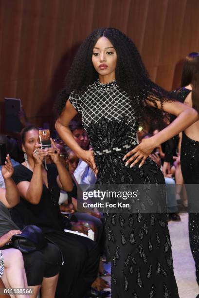 Model Anna Faye dressed by Sublim Elle walks the runway during the "Paris Appreciation Awards 2017" At The Eiffel Tower on July 8, 2017 in Paris,...