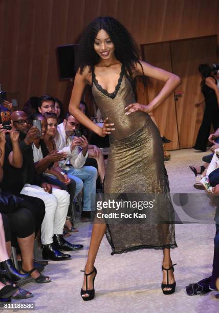 Model Anna Faye dressed by Verone Creatrice walks the runway during the "Paris Appreciation Awards 2017" At The Eiffel Tower on July 8, 2017 in...