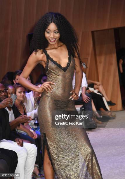 Model Anna Faye dressed by Verone Creatrice walks the runway during the "Paris Appreciation Awards 2017" At The Eiffel Tower on July 8, 2017 in...