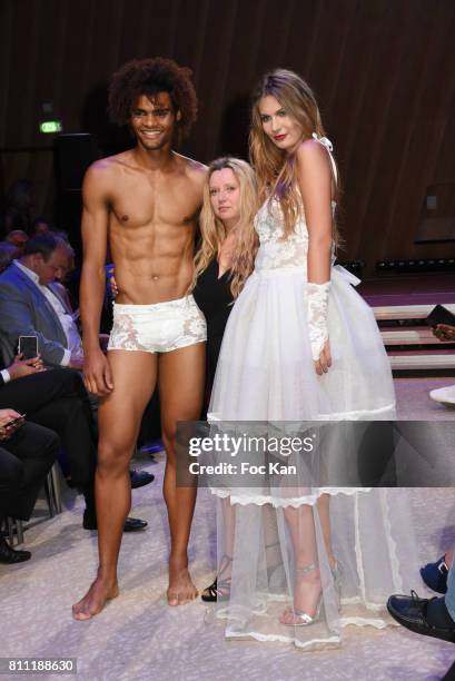 Models dressed by designer of Verone Creatrice walk the runway during the "Paris Appreciation Awards 2017" At The Eiffel Tower on July 8, 2017 in...