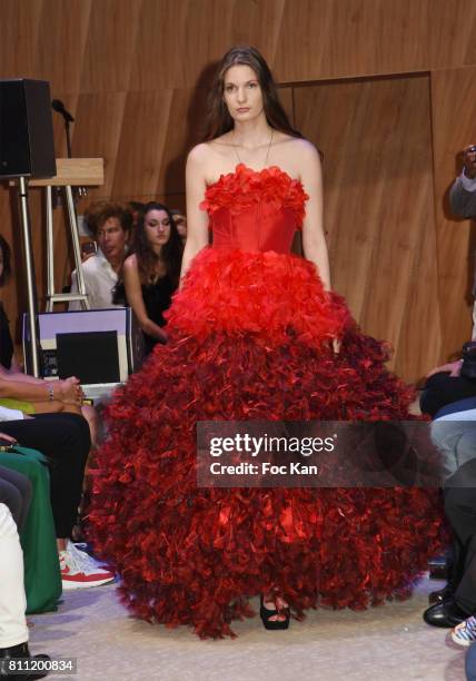 Model dressed by Dimitry Vincent for Hello Diit walks the runway during the "Paris Appreciation Awards 2017" At The Eiffel Tower on July 8, 2017 in...