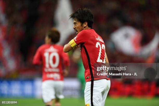 Yuki Abe of Urawa Red Diamonds reacts after scoring his side's first goal during the J.League J1 match between Urawa Red Diamonds and Albirex Niigata...