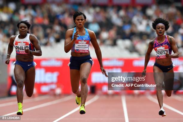 Nigeria's Blessing Okagbare-Ighoteguonor leads Jamaica's Elaine Thompson and Britain's Asha Philip in a heat of the women's 100m during the IAAF...