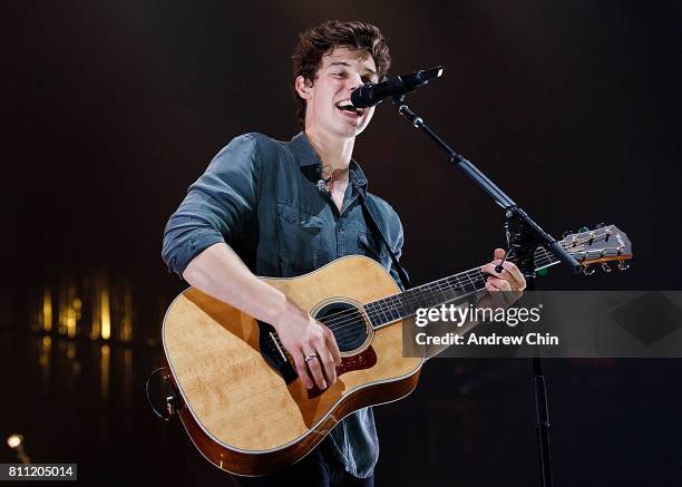 Canadian singer-songwriter Shawn Mendes performs on stage during his 'Illuminate World Tour' at Rogers Arena on July 8, 2017 in Vancouver, Canada.