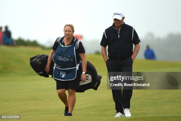 David Drysdale of Scotland walks to the 18th green with wife / caddie Vicky during the final round of the Dubai Duty Free Irish Open at Portstewart...