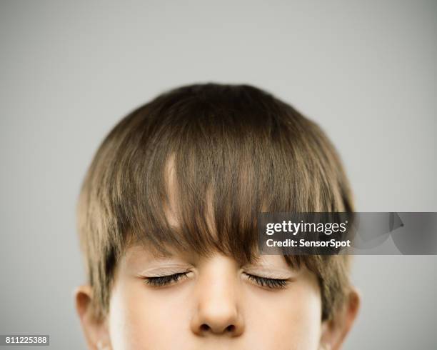 real kid with eyes closed - child eyes closed stock pictures, royalty-free photos & images