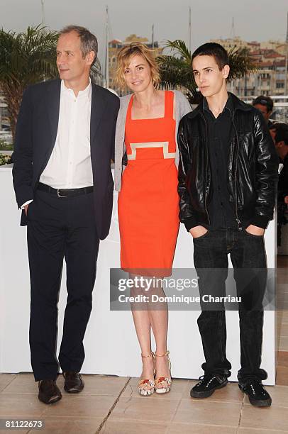 Actors Hippolyte Girardot, Anne Consigny and Emile Berling attend the Un Conte de Noel photocall at the Palais des Festivals during the 61st Cannes...