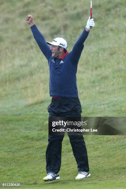 Jon Rahm of Spain celebrates holing his third shot on the 4th hole for an eagle during the final round of the Dubai Duty Free Irish Open at...