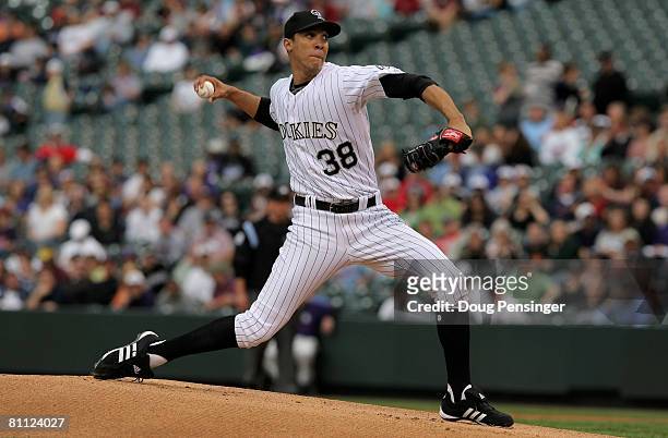 Starting pitcher Ubaldo Jimenez of the Colorado Rockies delivers against the Minnesota Twins during Interleague MLB action at Coors Field on May 16,...