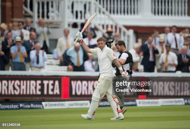 England Captain Joe Root raises his bat to the Lord's crowd at th eend of play during Day One of the 1st Investec Test Match between England and...