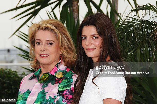 Actresses Catherine Deneuve and Chiara Mastroianni attend the Un Conte de Noel photocall at the Palais des Festivals during the 61st Cannes...
