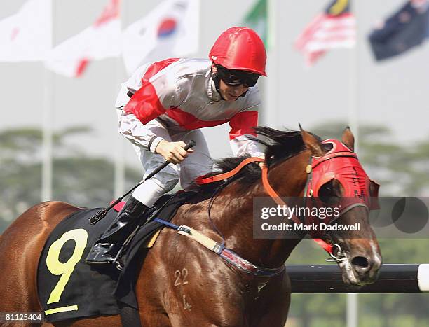Classic Key ridden by Danny Beasley wins Race Four the Selangor Turf Club Trophy during the Singapore Turf Club meeting at Singapore Turf Club on May...