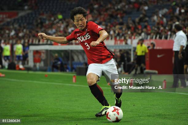 Tomoya Ugajin of Urawa Red Diamonds in action during the J.League J1 match between Urawa Red Diamonds and Albirex Niigata at Saitama Stadium on July...