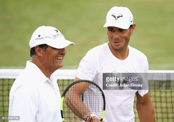 Rafael Nadal of Spain in a training session with coach and uncle Toni Nadal at Wimbledon on July 9, 2017 in London, England.