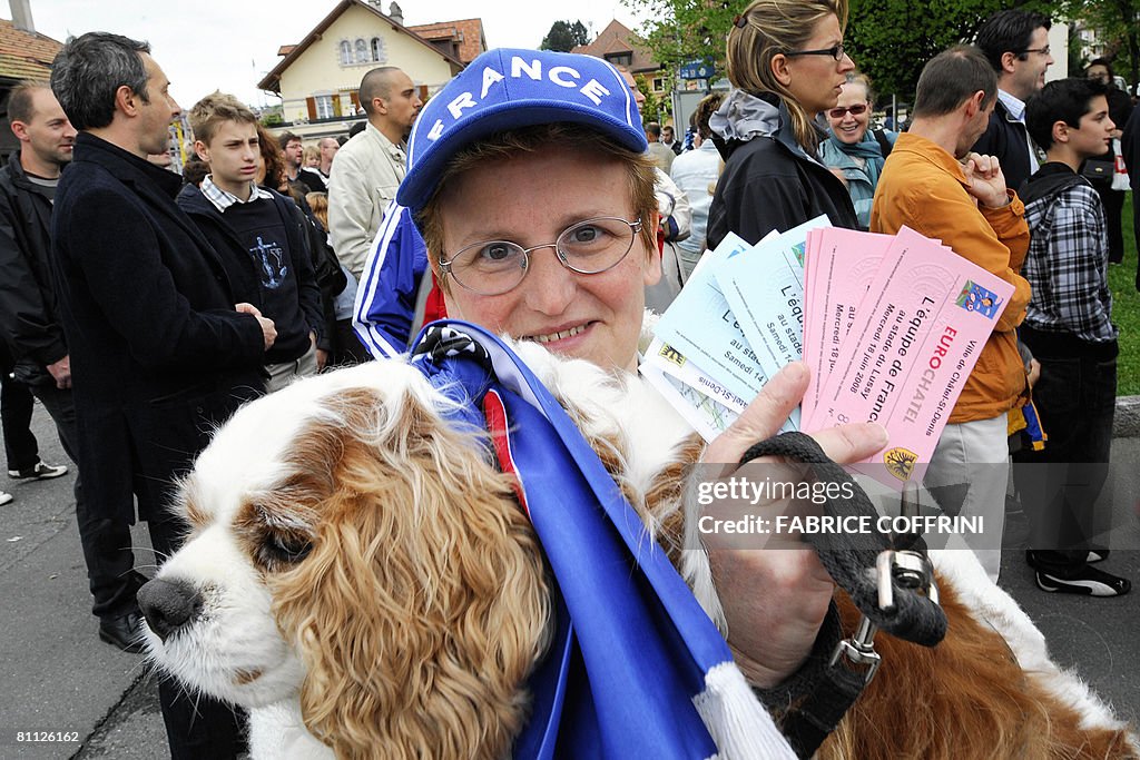 French supporter, Annick, poses with her