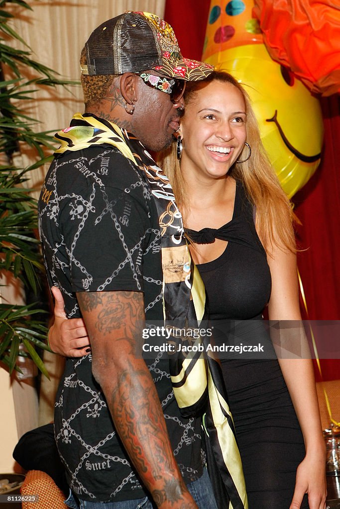 Former NBA player Dennis Rodman and daughter Alexis Rodman celebrate