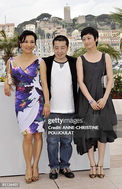 Chinese actress Joan Chen, director Jia Zhang Ke and actress Zhao Tao pose during a photocall for their film '24 City' at the 61st Cannes...