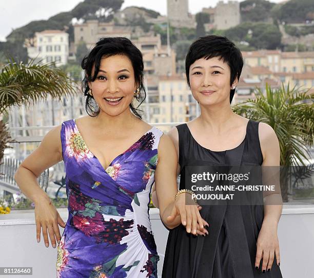 Chinese actresses Joan Chen and Zhao Tao pose during a photocall for Chinese director Jia Zhang Ke's film '24 City' at the 61st Cannes International...