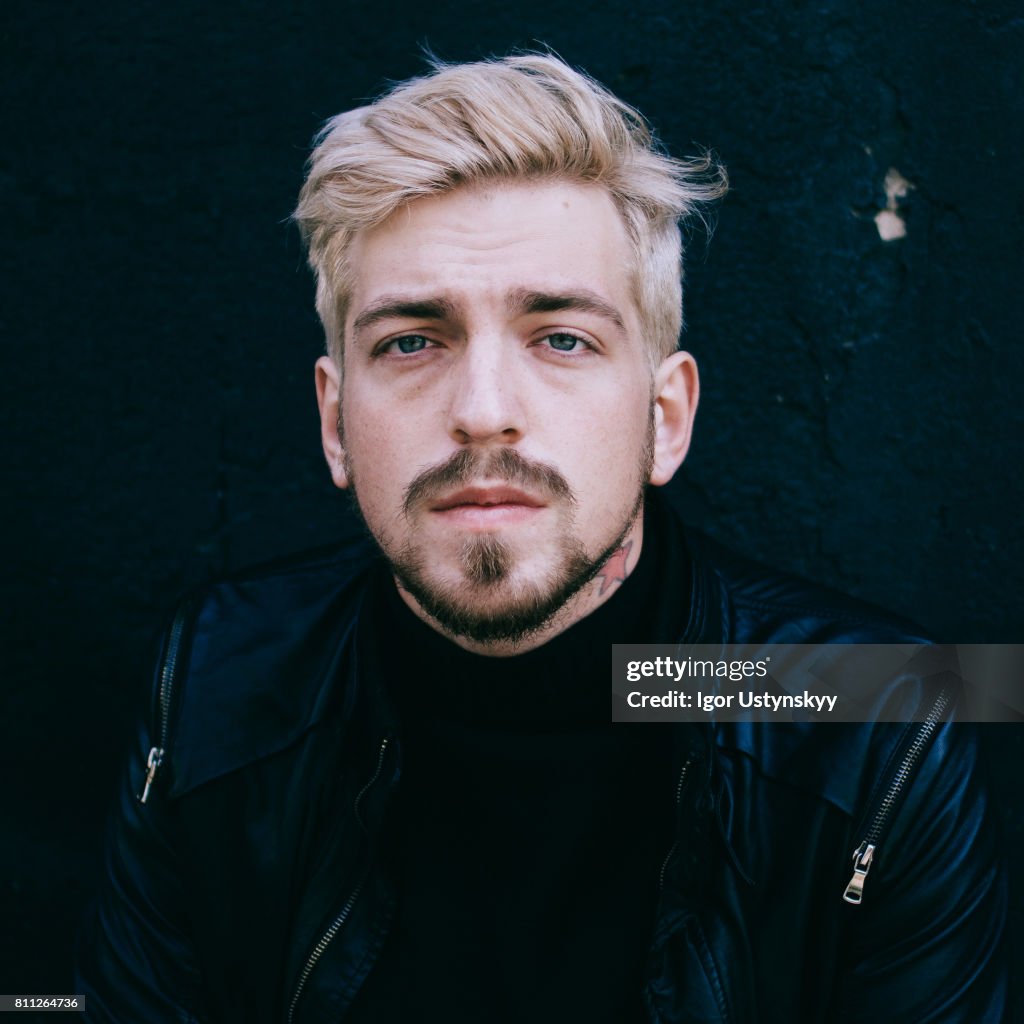 Portrait of man on the black background