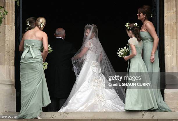 Canadian Autumn Kelly arrives for her wedding to Peter Phillips grandson of Queen Elizabeth, at the St George's Chapel at Windsor Castle on May 17,...