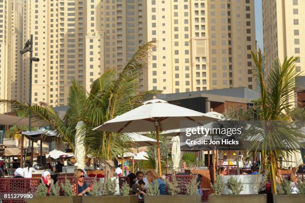 a beachside cafe on the walk at jbr, dubai. - dubai jbr stock pictures, royalty-free photos & images