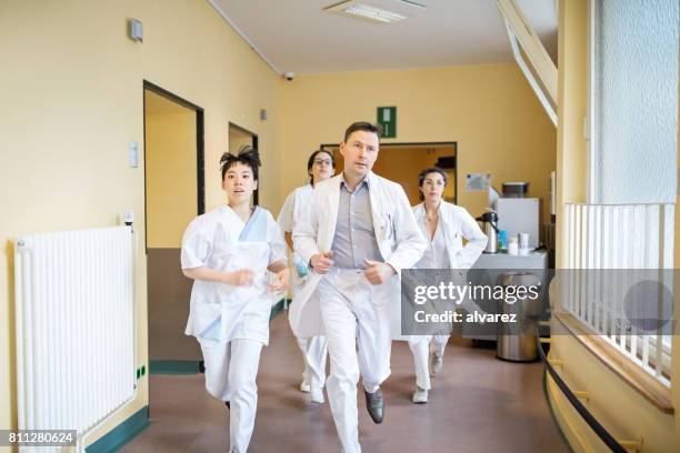 Medical Rushing Emergency Responder Running Photos and Premium High Res Pictures ...