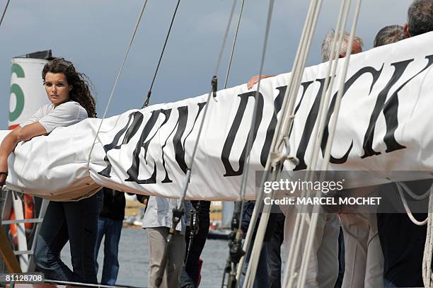 Marie Tabarly, the daughter of French sailing legend late Eric Tabarly, poses aboard her father's monohull 'Pen Duick I' during the opening of 'City...