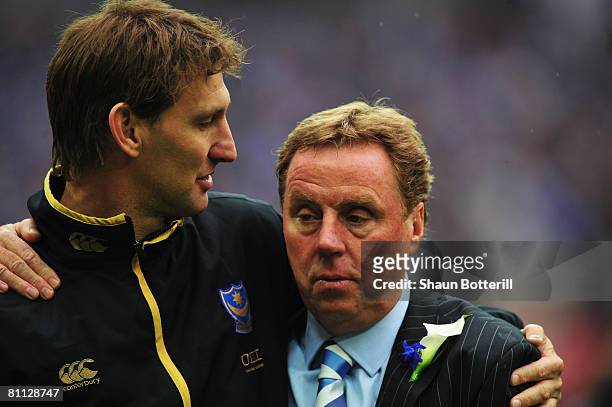 Harry Redknapp manager of Portsmouth is congratulated by Tony Adams following the FA Cup Final sponsored by E.ON between Portsmouth and Cardiff City...