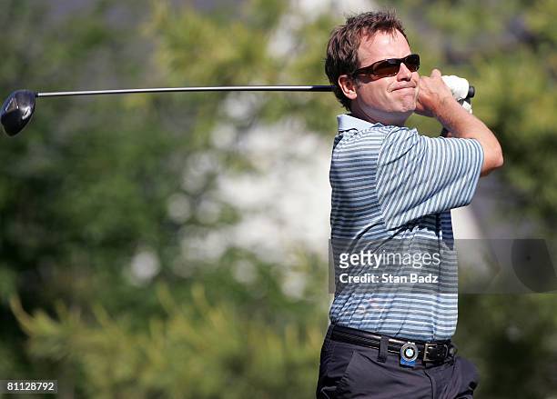 Actor Greg Kinnear hits from the first tee box during the third round of the BMW Charity Pro-Am at Thornblade Club held on May 17, 2008 in Greer,...