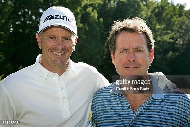 Rick Price and playing partner actor Greg Kinnear pose for a photo before the third round of the BMW Charity Pro-Am at Thornblade Club held on May...
