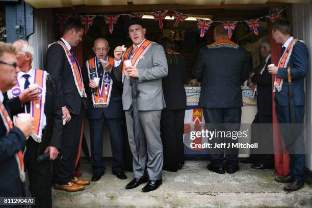 Members of the Orange Order have tea and sandwiches following their weekly march at Drumcree Church on July 9, 2017 in Drumcree, Northern Ireland....