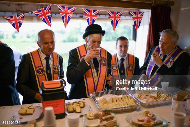 Members of the Orange Order have tea and sandwiches following their weekly march at Drumcree Church on July 9, 2017 in Drumcree, Northern Ireland....