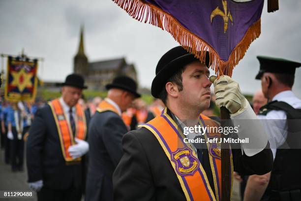 Members of the Orange Order hold a prayer service during their weekly protest at Drumcree Church on July 9, 2017 in Drumcree, Northern Ireland. The...