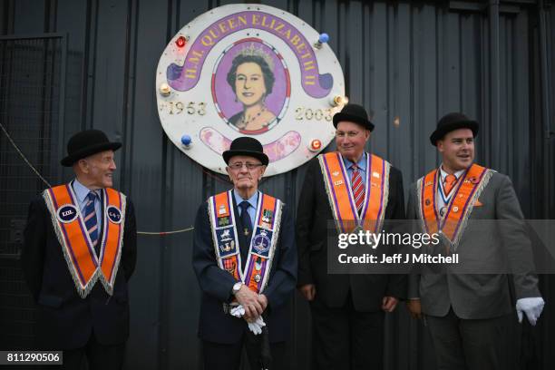 Members of the Orange Order hold a prayer service during their weekly protest at Drumcree Church on July 9, 2017 in Drumcree, Northern Ireland. The...