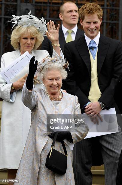 Members of Britains royal family, Prince Harry , Queen Elizabeth II and Britain's Prince Charles' wife Camilla leave St George's Chapel in Windsor on...