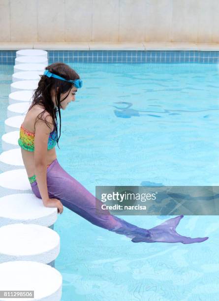 girl with mermaid tail - mermaid stock pictures, royalty-free photos & images