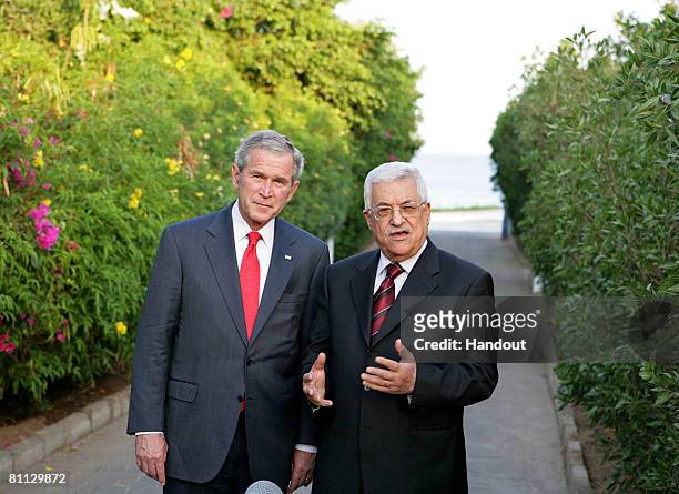 In this handout image provided by the PPO, Palestinian President Mahmoud Abbas meets with U.S. President George W. Bush May 17, 2008 in Sharm...